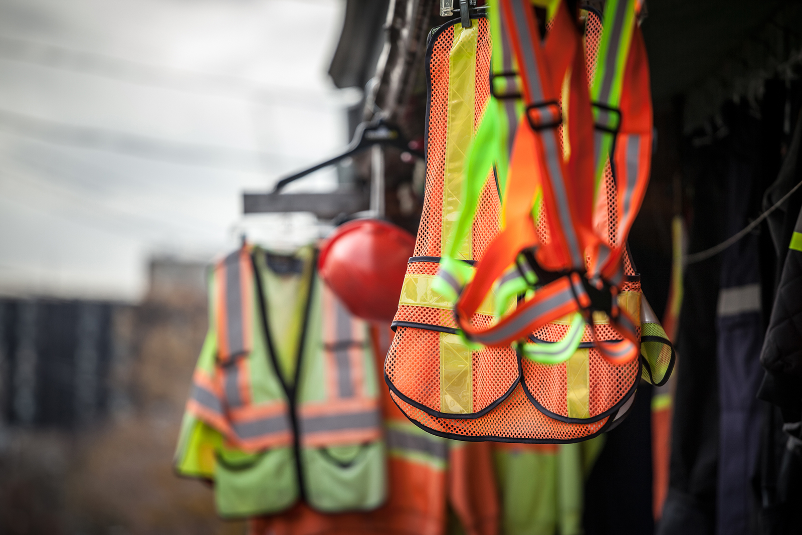 Safety vests and a hard hat