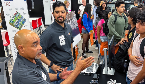 Members of the NextDecade team providing education